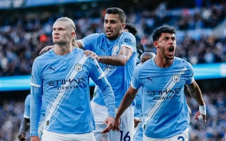 Manchester City vence o Arsenal por 2 a 1, encurta dist&acirc;ncia e esquenta a briga pelo t&iacute;tulo da Premier League
